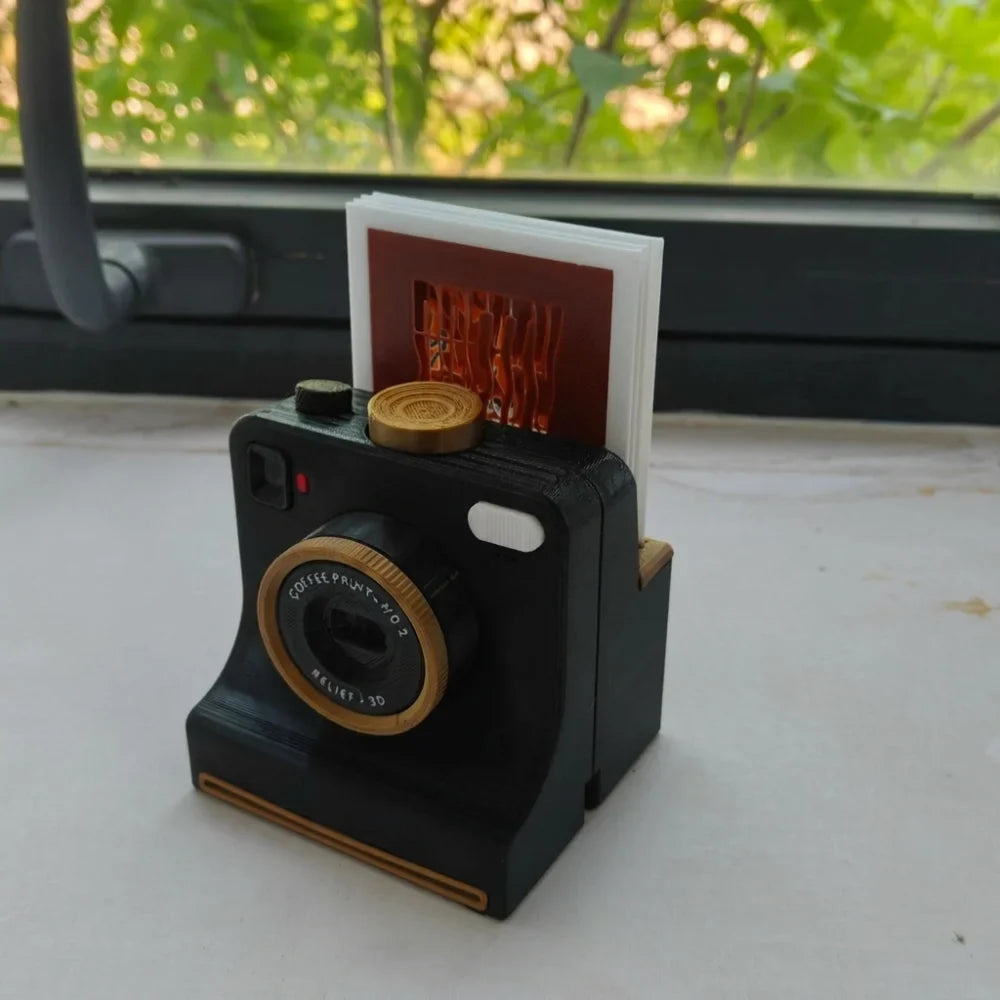 Black 3D printed camera inspired latte art stencil tool